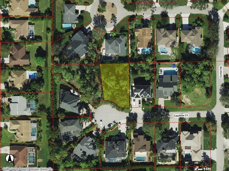 an aerial view of houses with yard