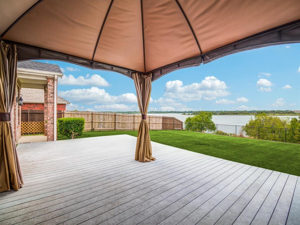 a view of outdoor space with garden and deck