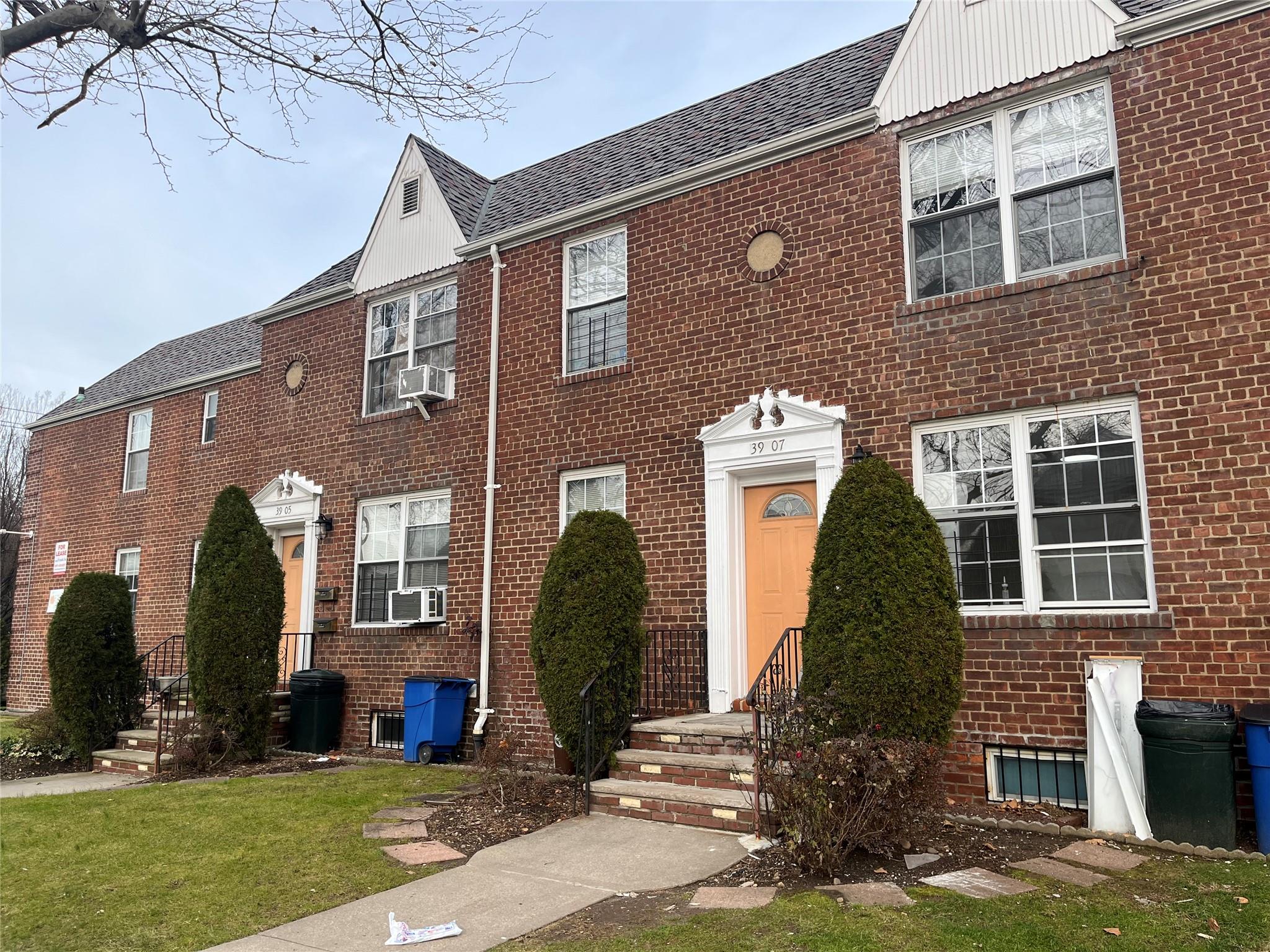 front view of house with a yard