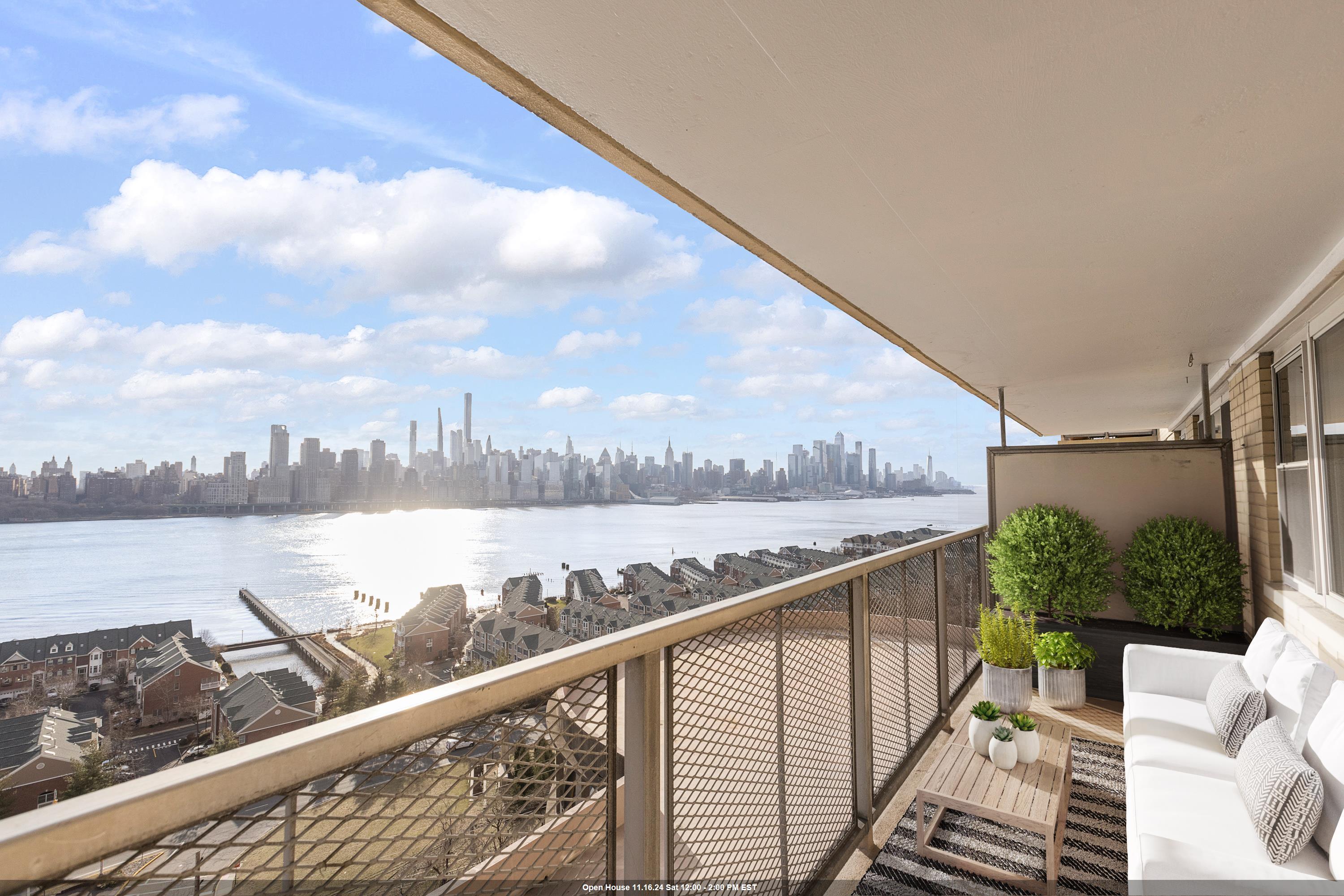 a view of a balcony next to a lake view