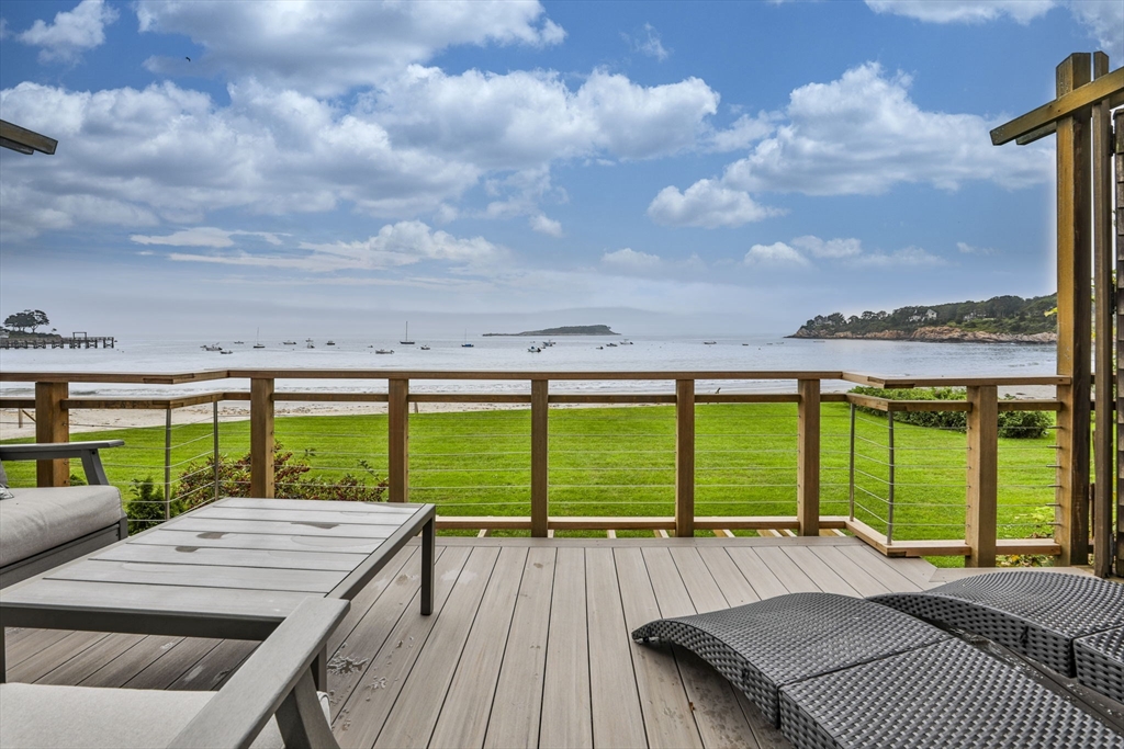 a view of a patio with wooden floor