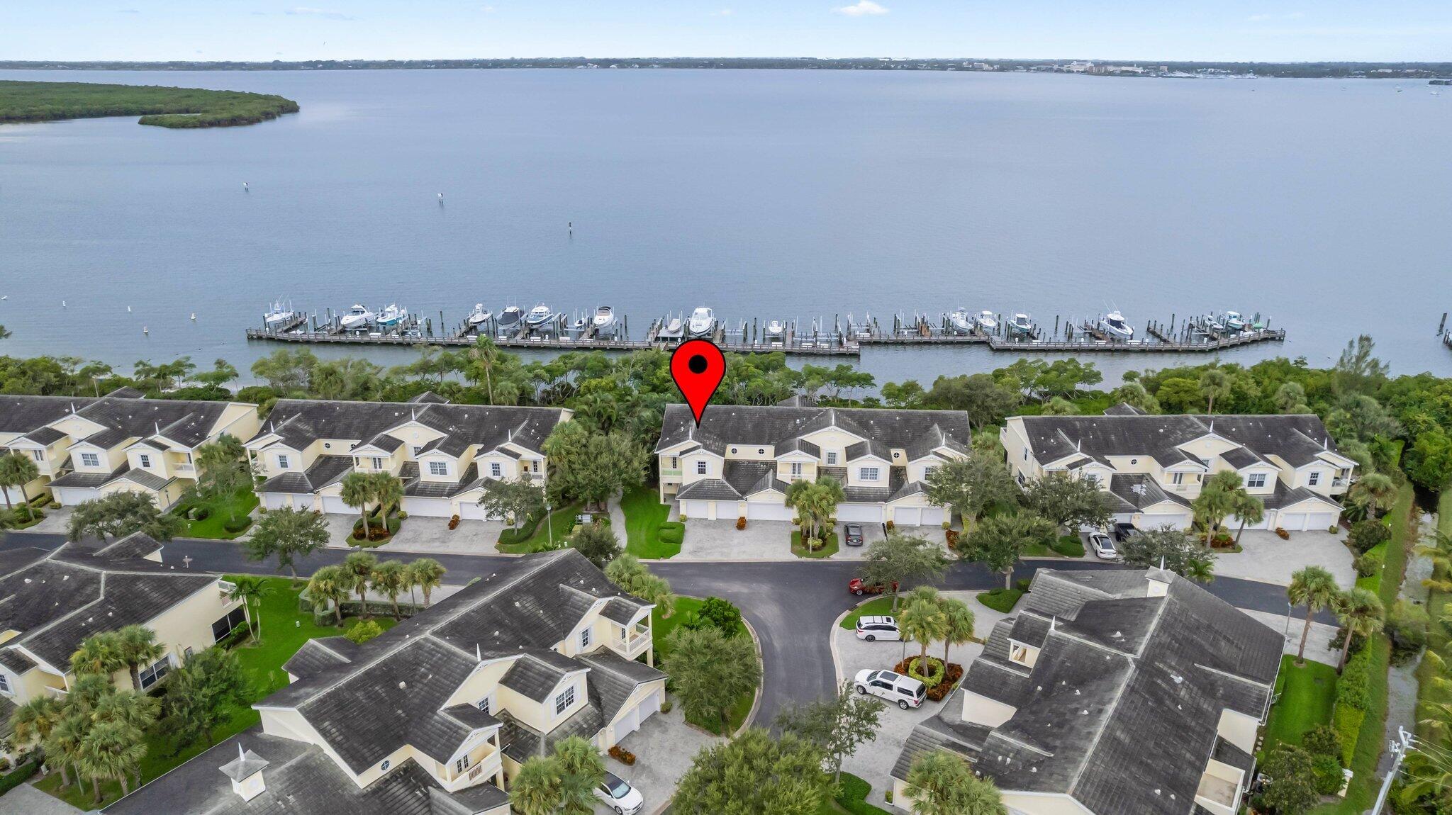 an aerial view of houses with outdoor space