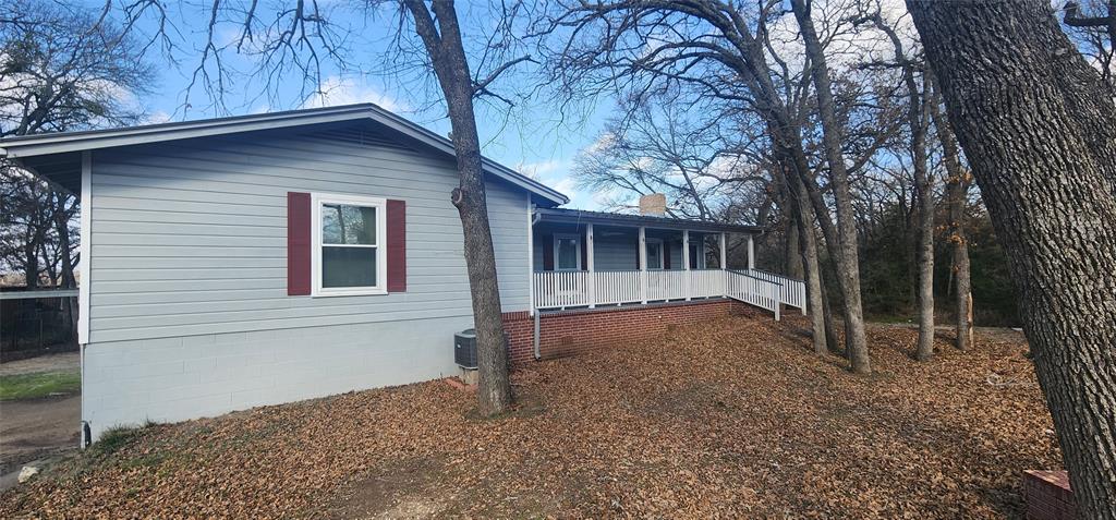 a house with trees in front of it