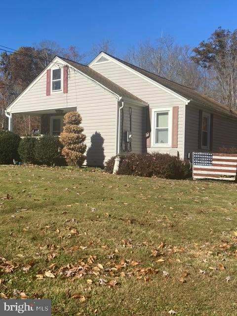 a front view of house with yard