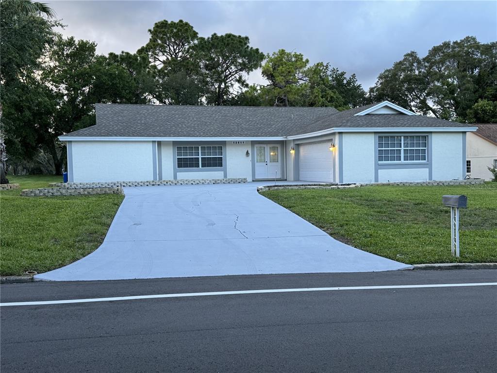 front view of a house and a yard