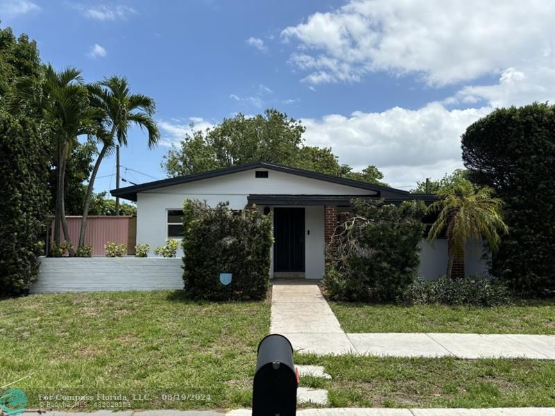 front view of house with a yard