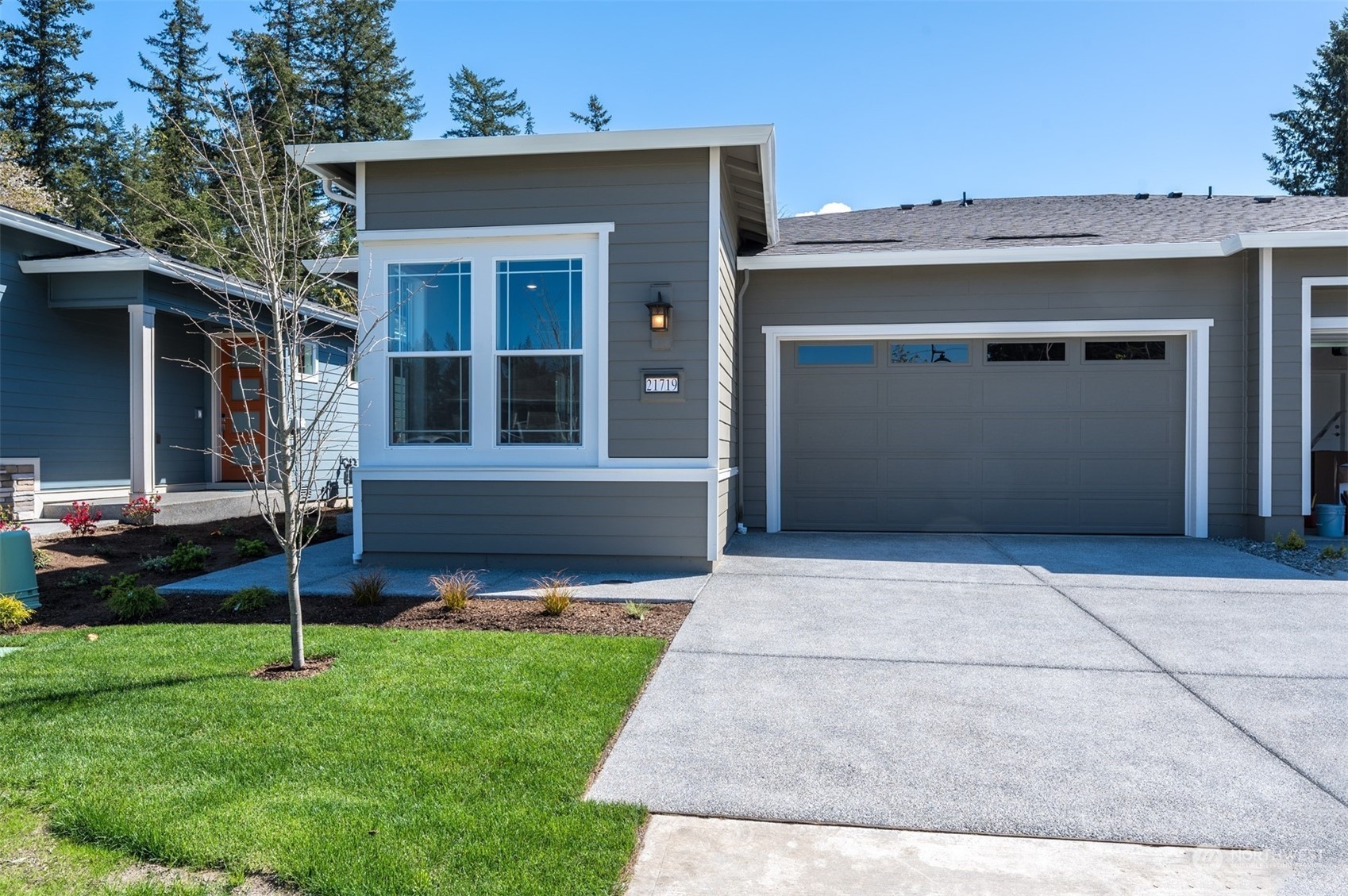 front view of a house with a yard