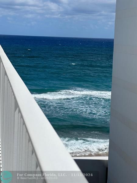 a view of ocean from a balcony