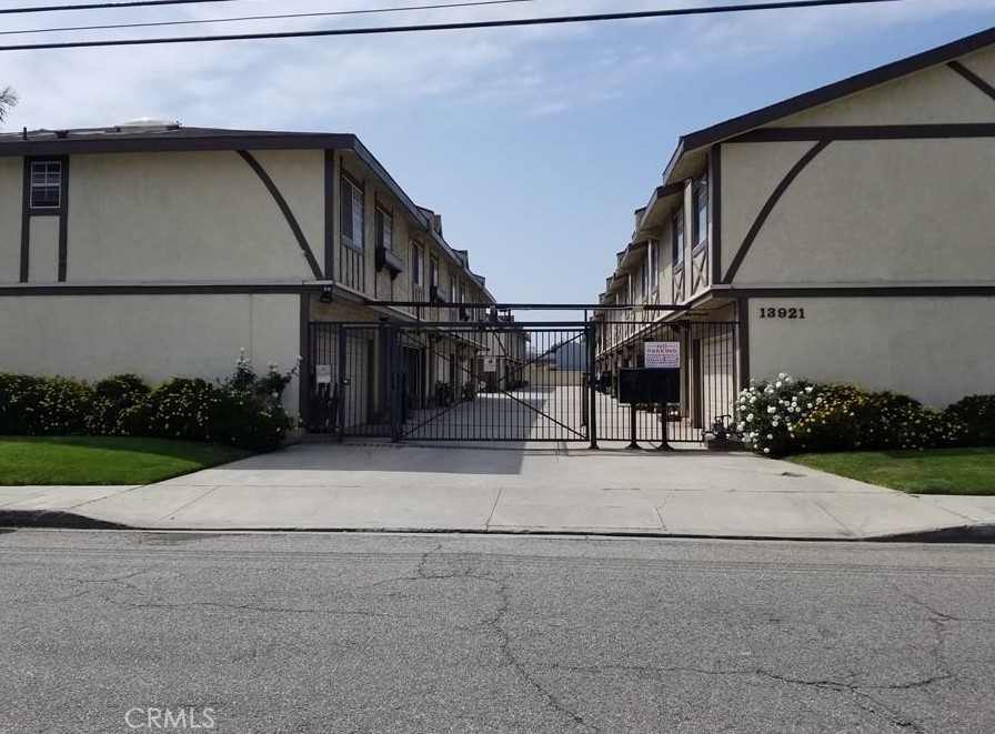 a view of a house with a street