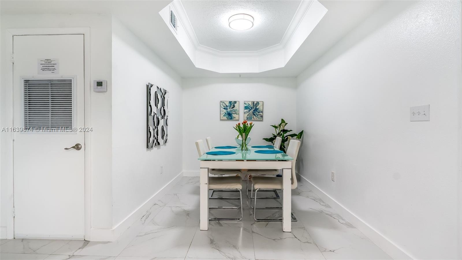 a view of a dining room with furniture