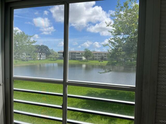 a view of a lake from a window