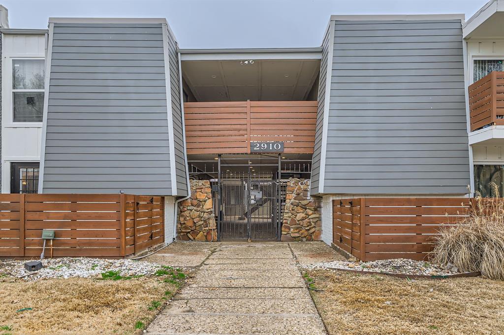 a front view of a house with garage