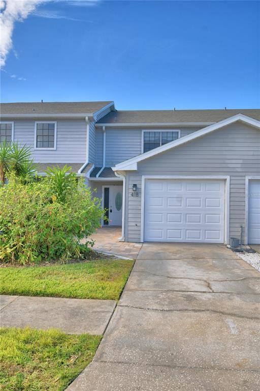 a front view of house with yard