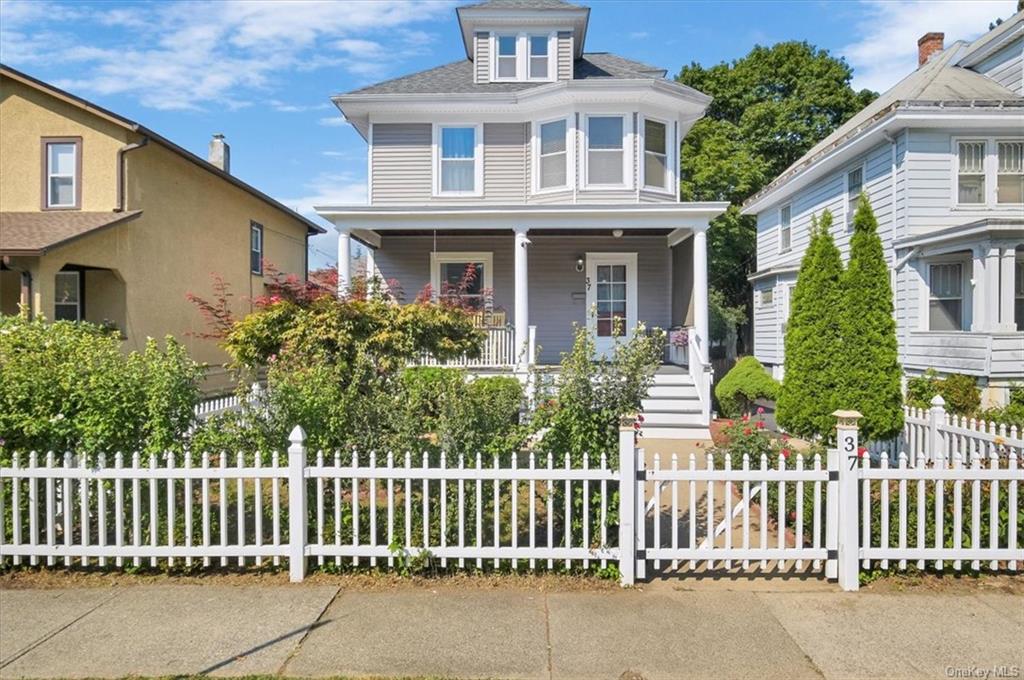 The house with a white picket fence