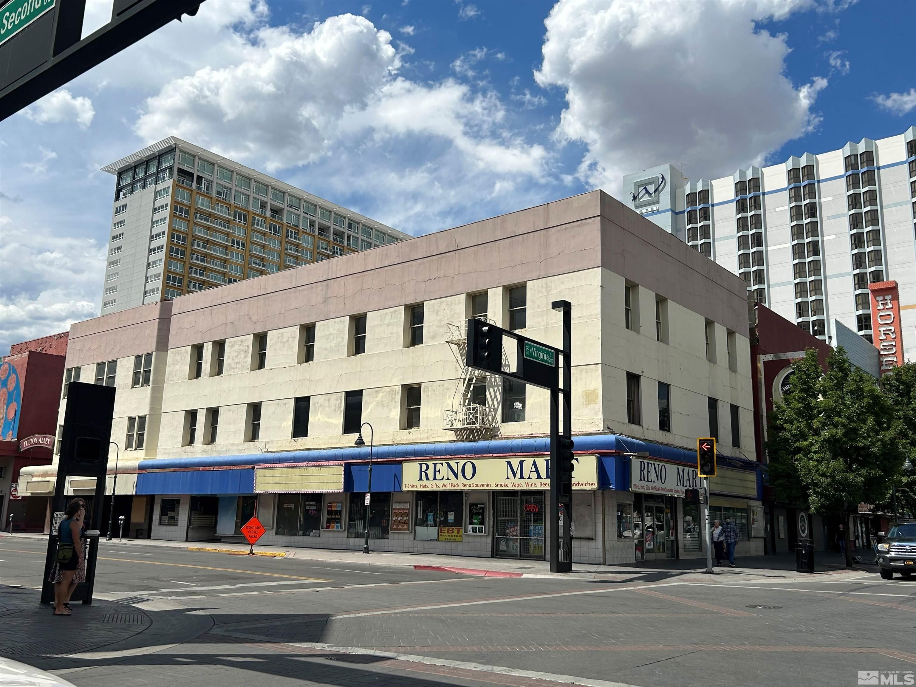 a view of a building and a street