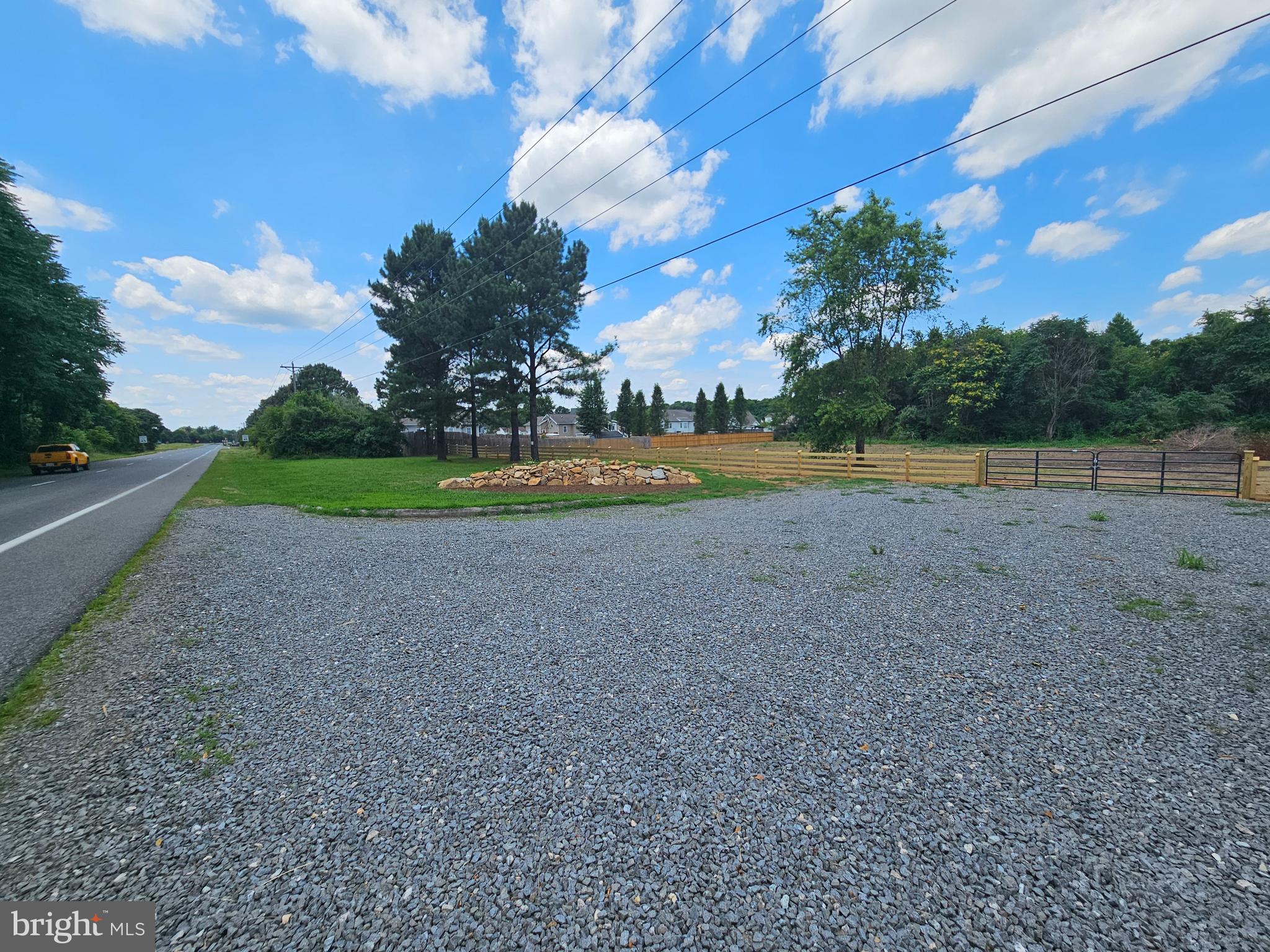 a view of outdoor space with playground and green space