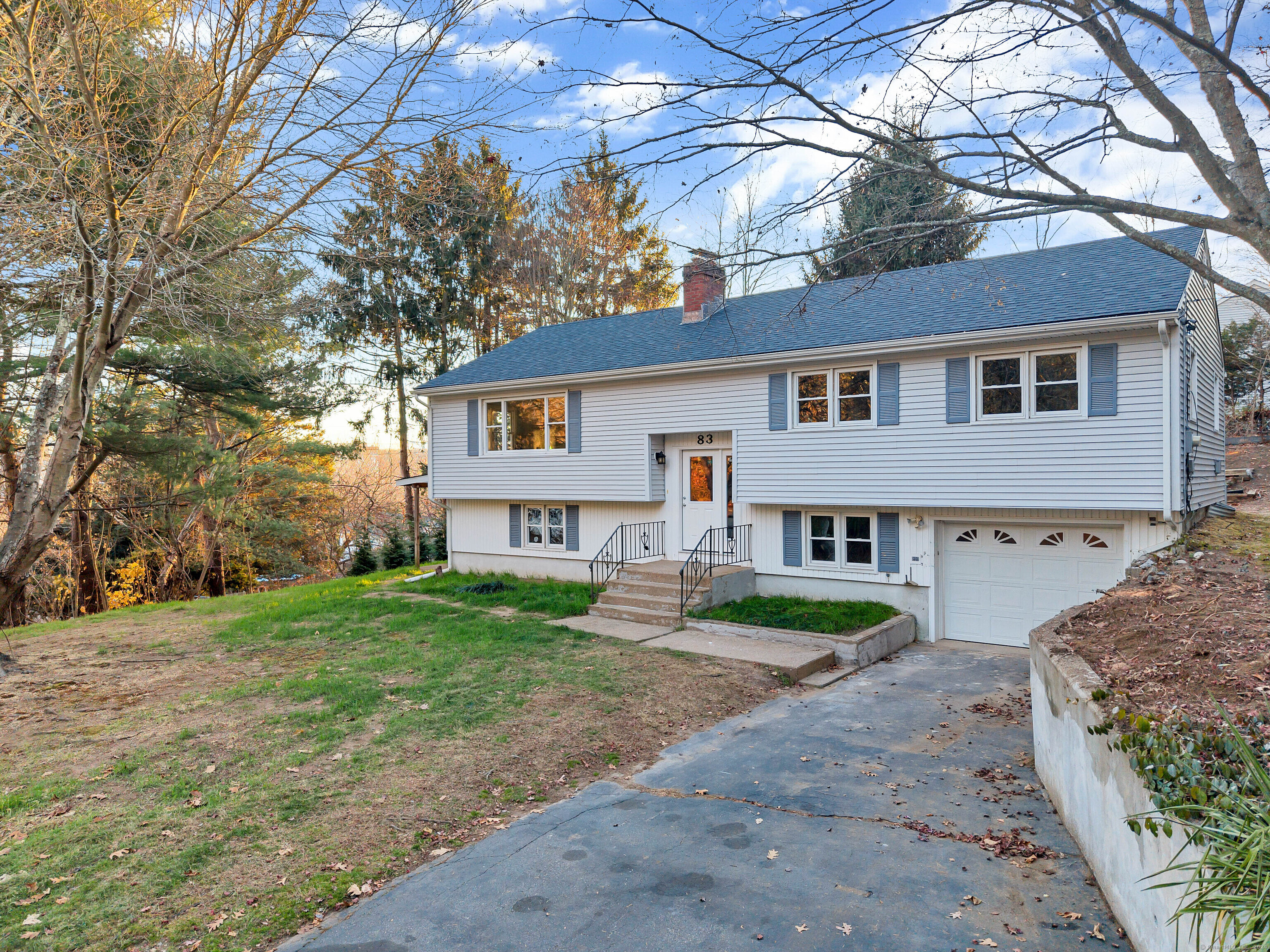 a house view with a backyard space