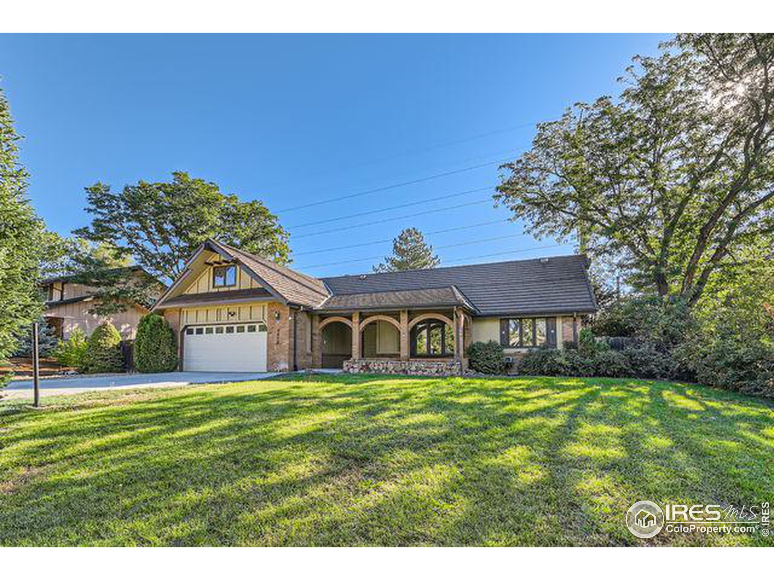 a view of a house with a big yard