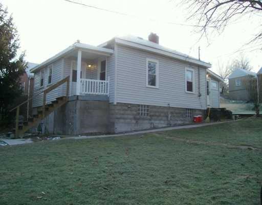 a view of backyard of house