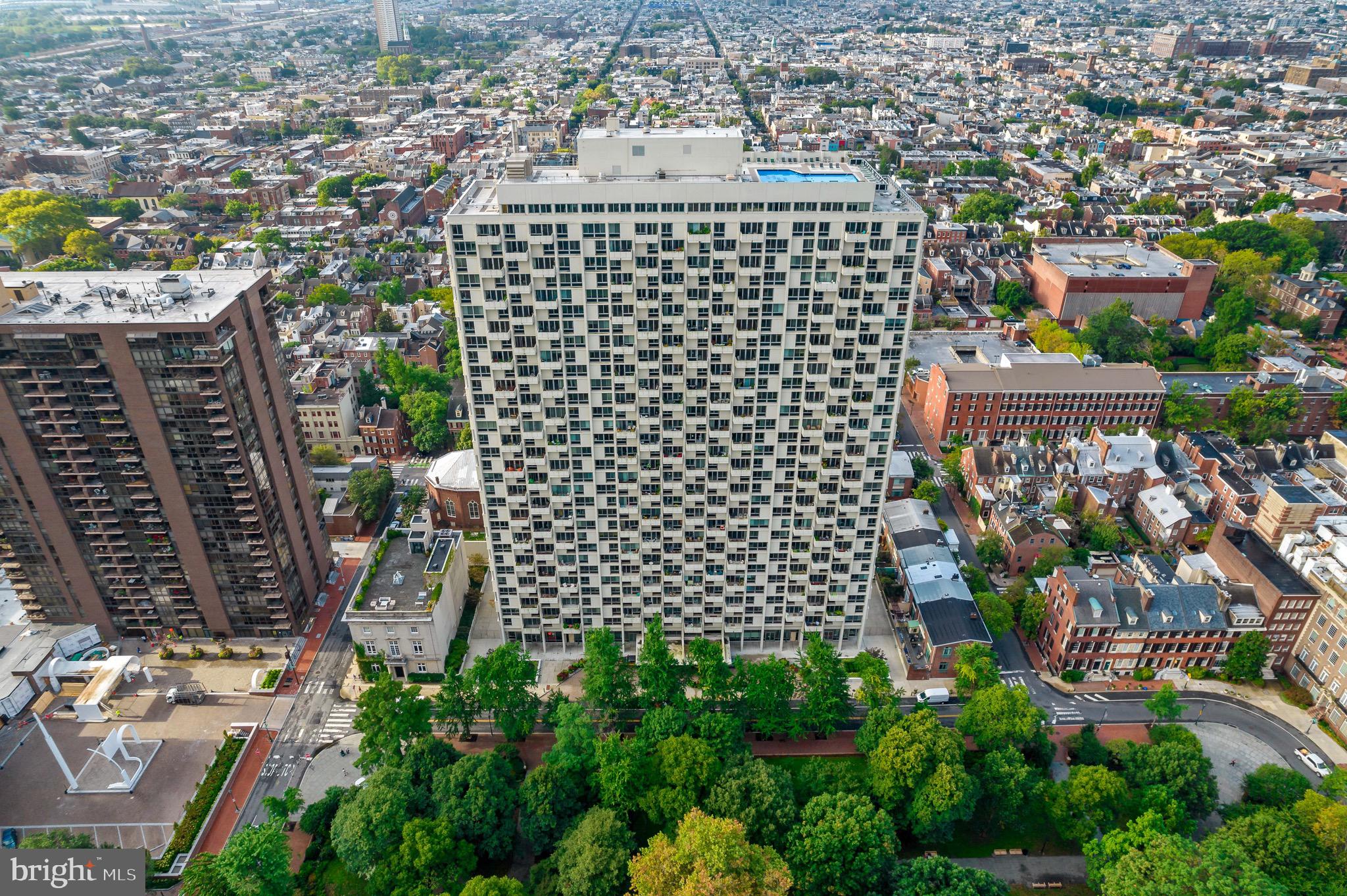 a view of a city with tall buildings