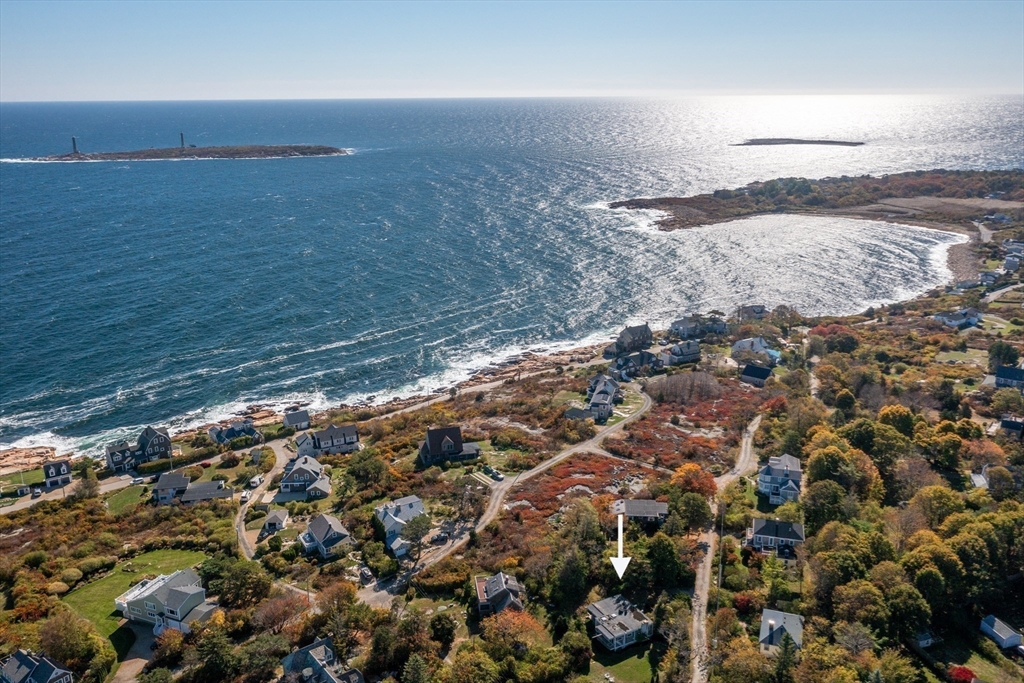 a view of beach and an ocean