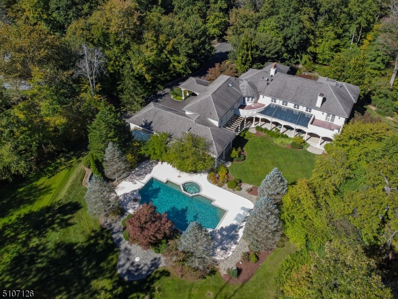 an aerial view of a house with a garden