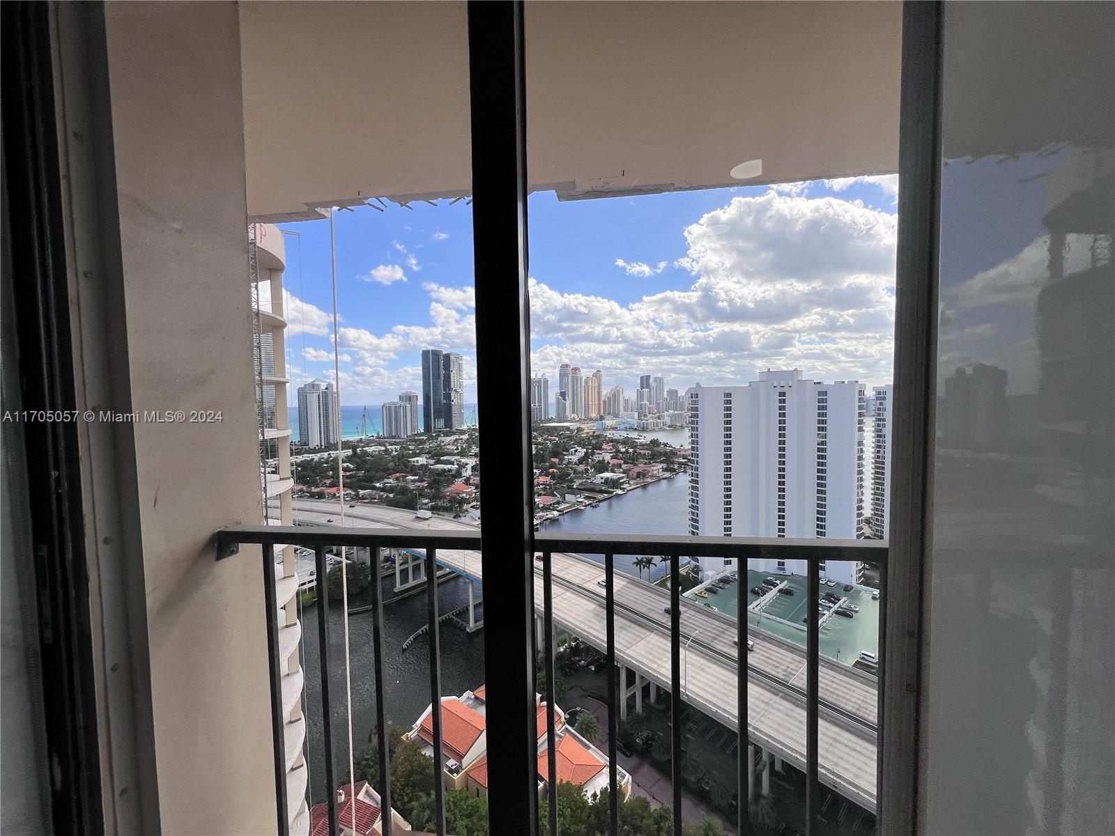 a view of a city from a balcony