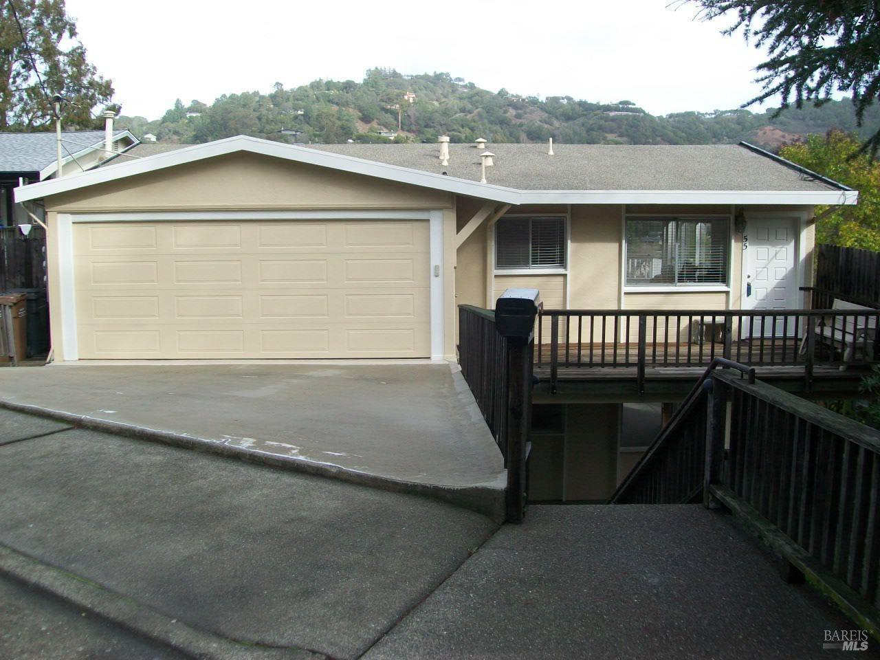 a view of a house with a roof deck