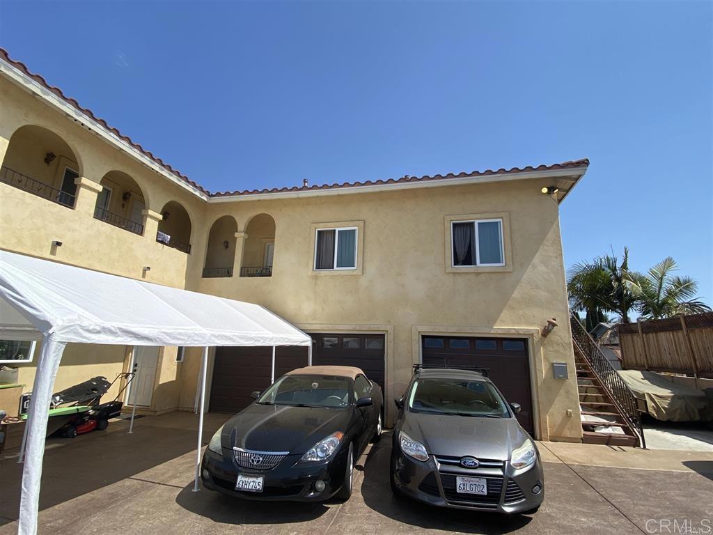 a car parked in front of a house