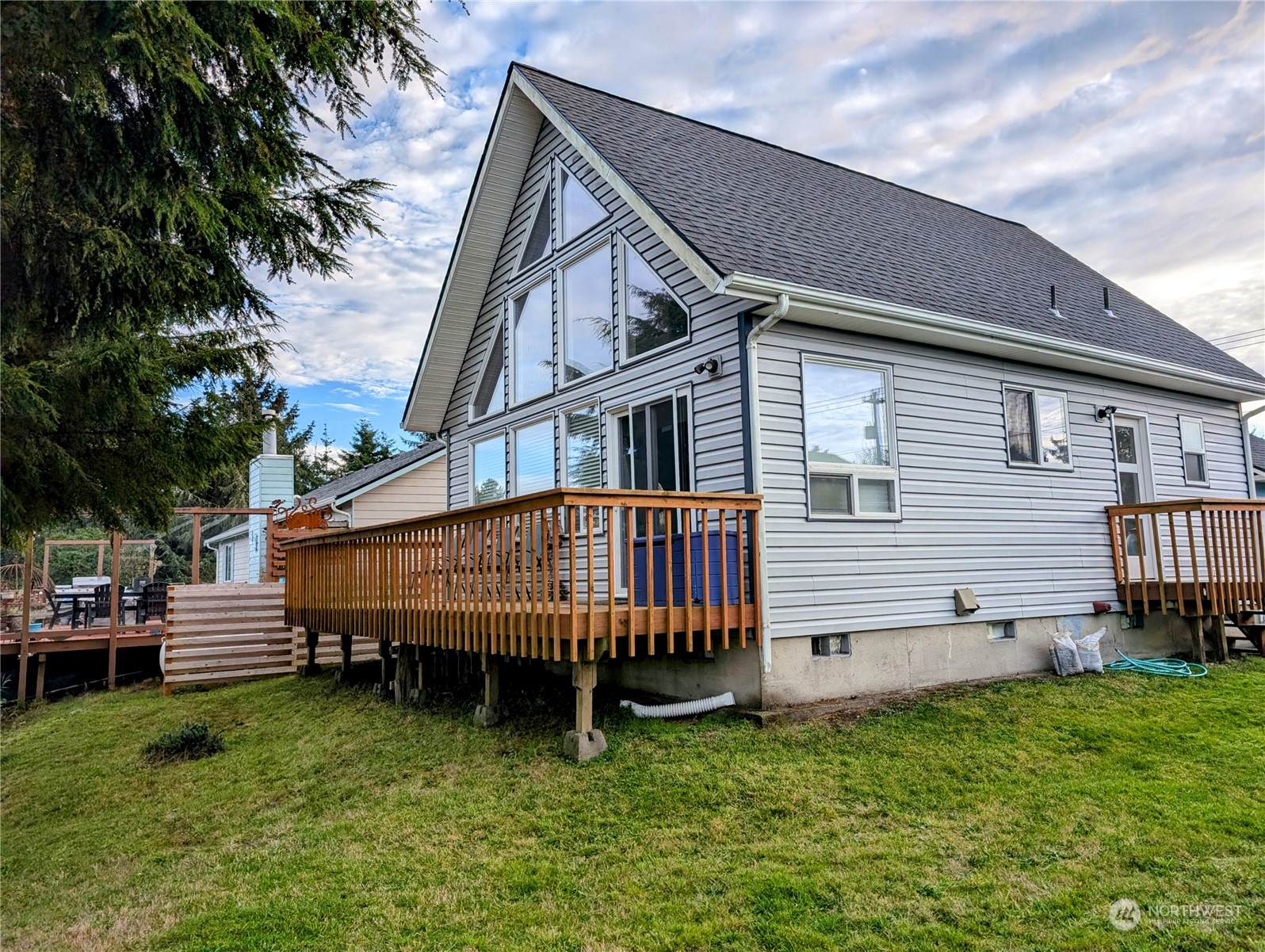 a view of backyard with deck