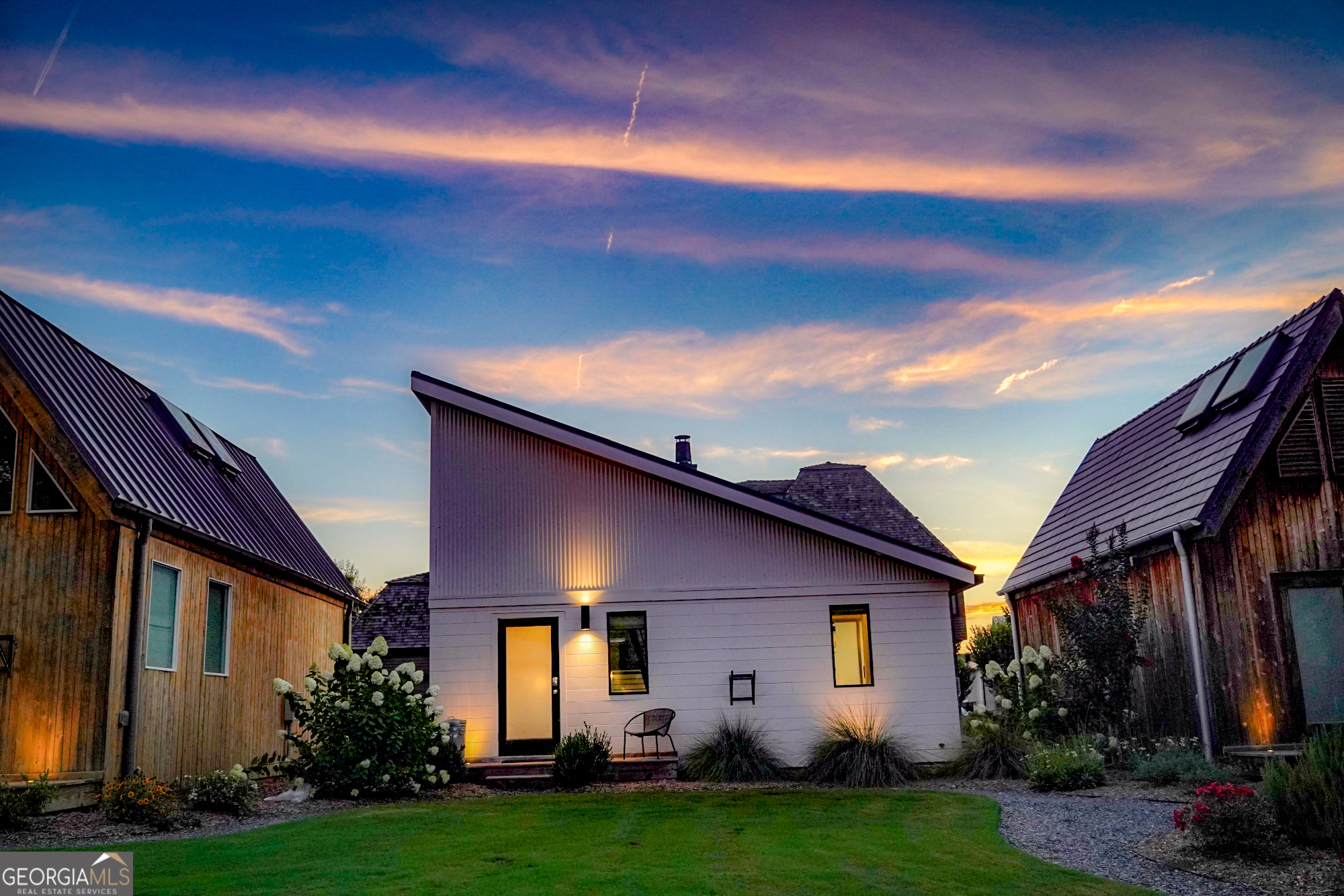 a view of a yard in front of a house