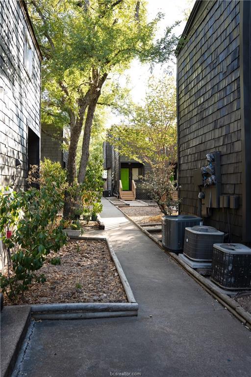 a view of a backyard with sitting area