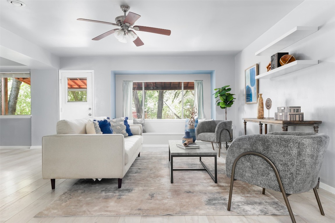 a living room with furniture and a window