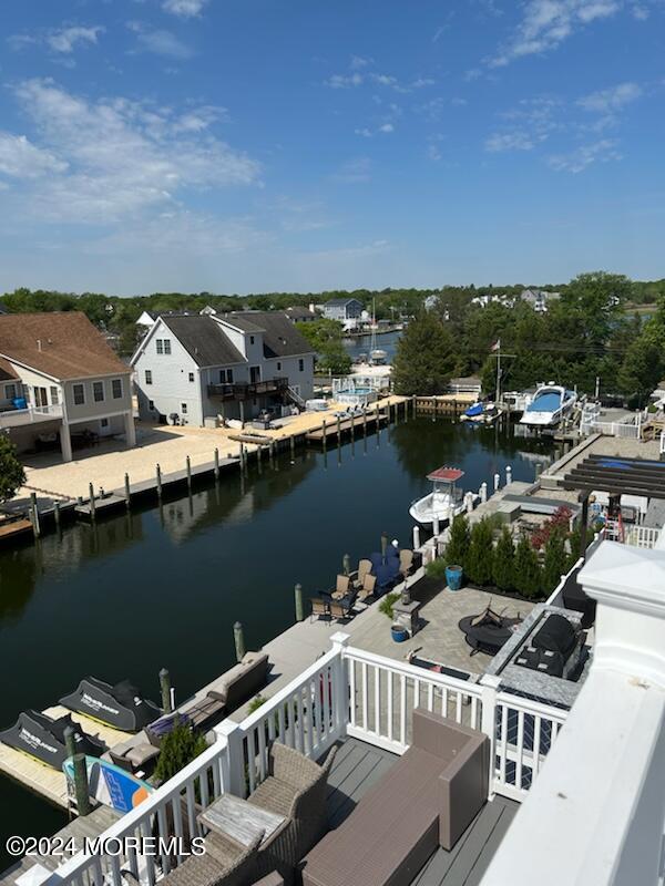 an aerial view of a house with a ocean view