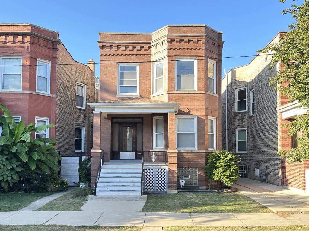 a front view of a multi story residential apartment building