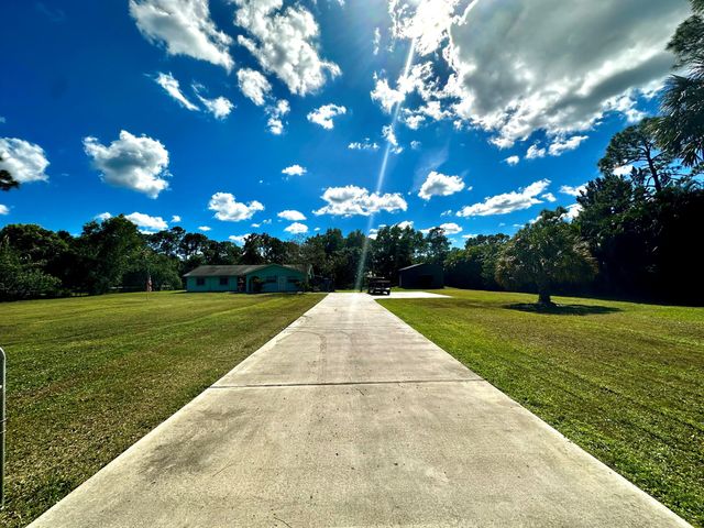 $649,999 | 12830 165th Road North | Jupiter Farms