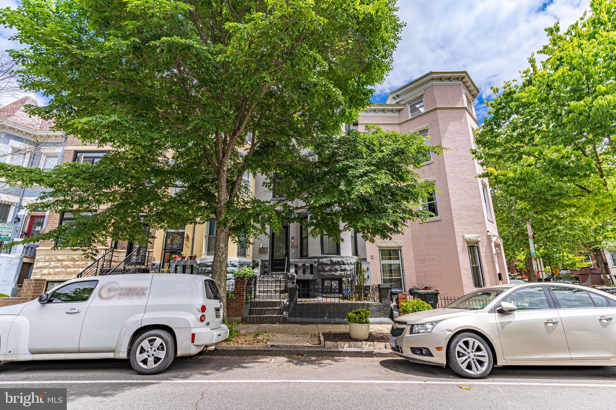 a car parked in front of a house