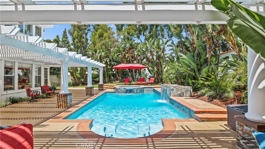 a view of a swimming pool with a patio