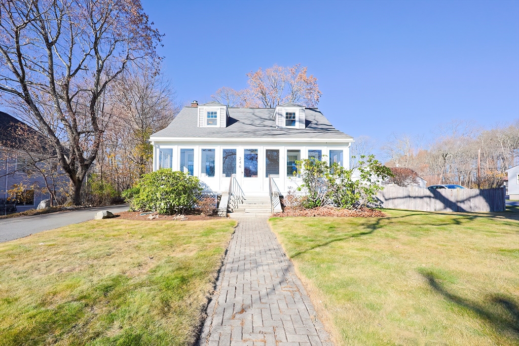 a view of a house with swimming pool