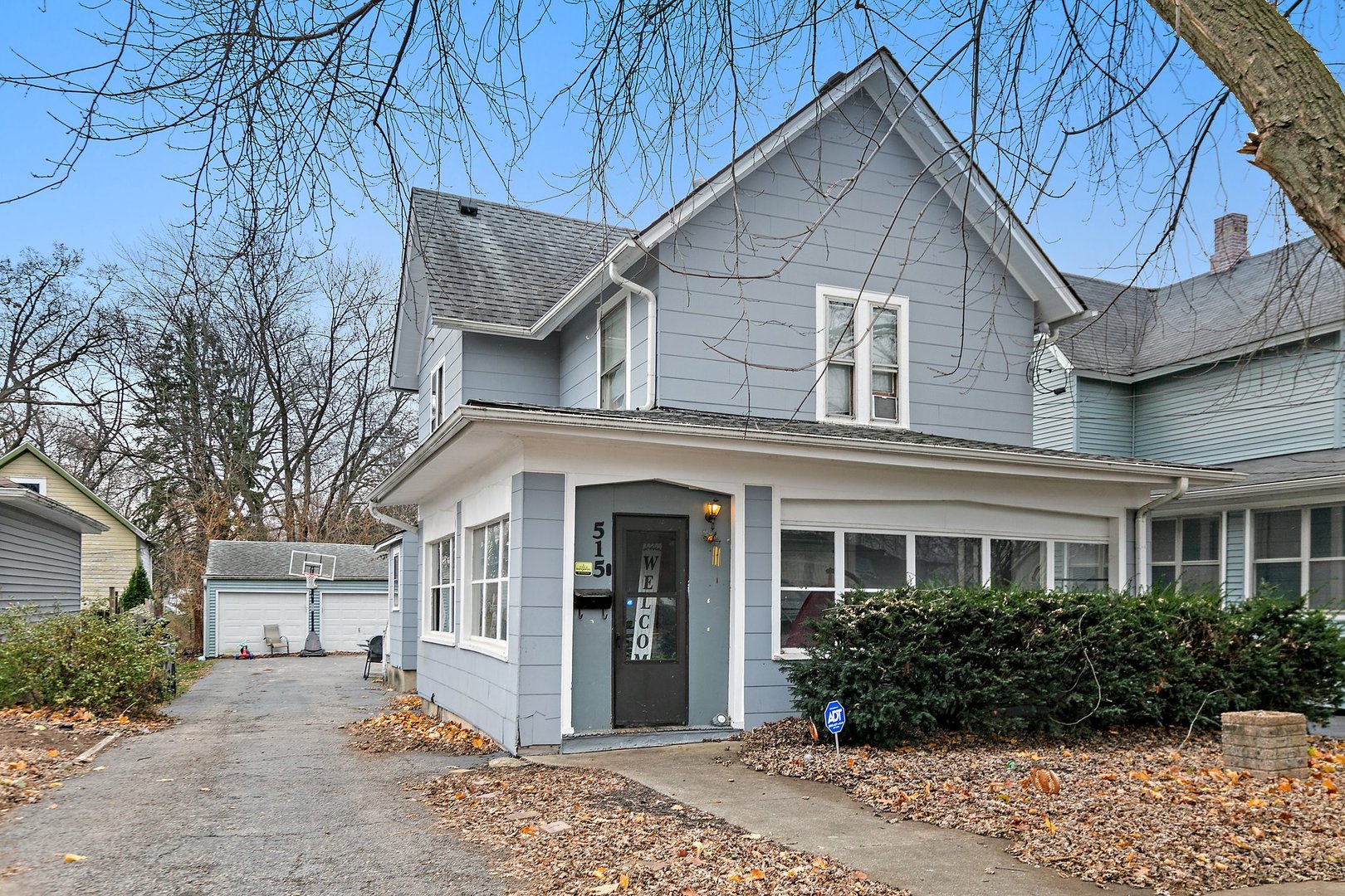 a view of a house with a yard