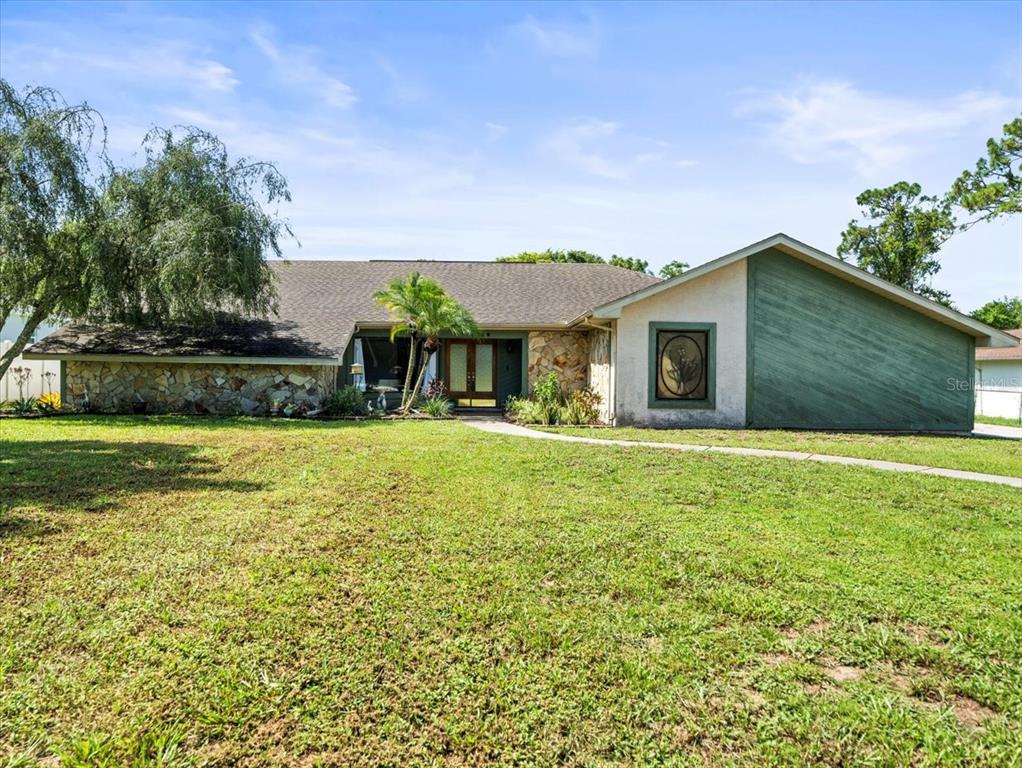 a front view of house with yard