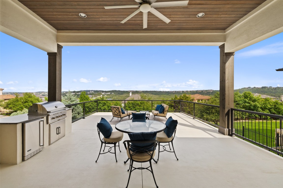 a view of swimming pool with outdoor seating