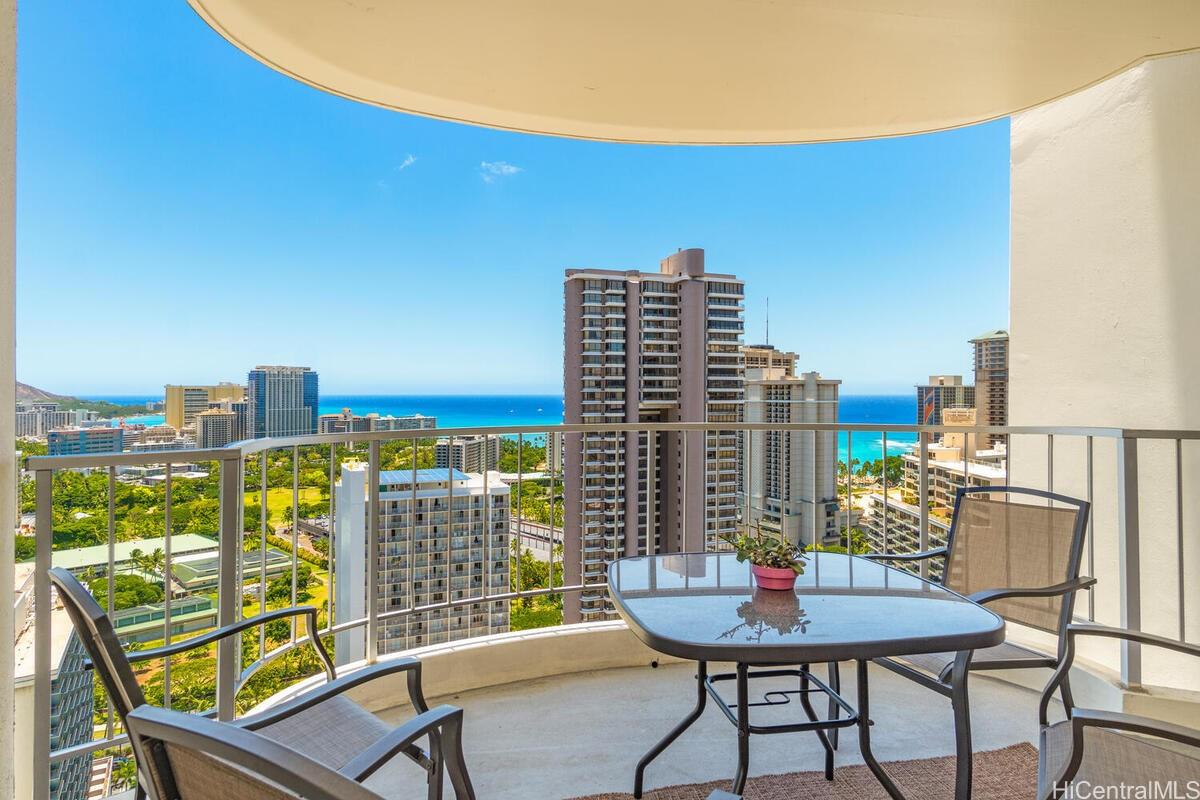 a view of a balcony with city view