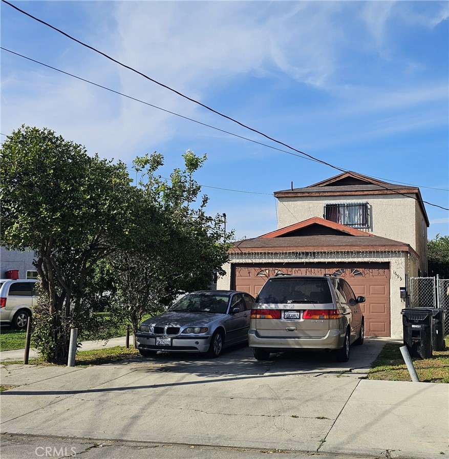 a car parked in front of a house