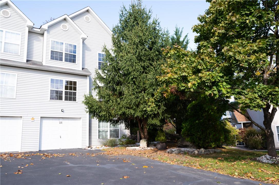 View of front of property with a garage