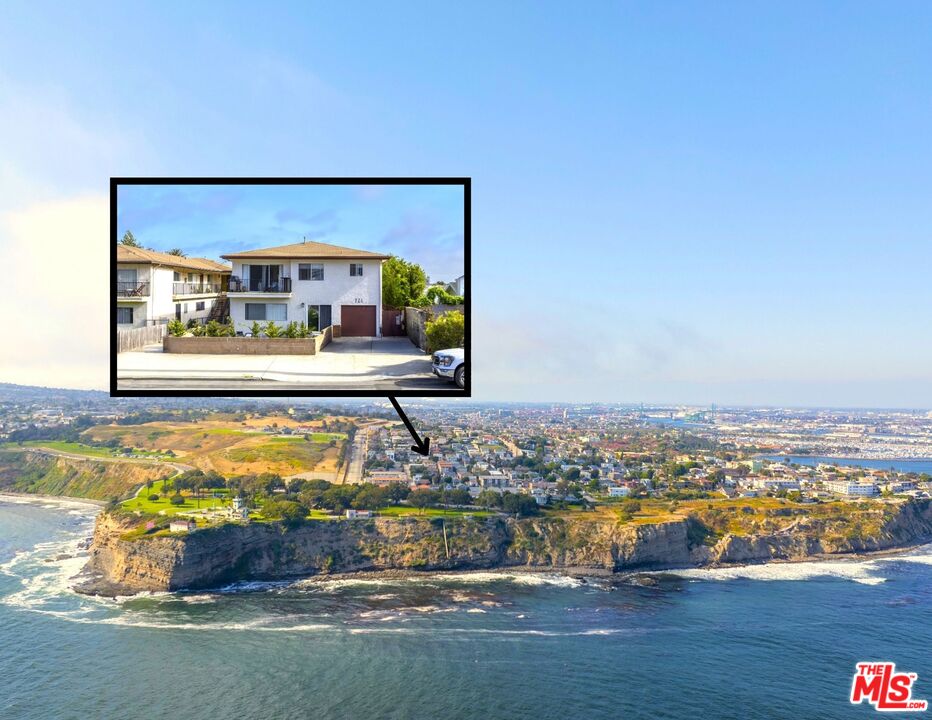 a room with water view and view of living room