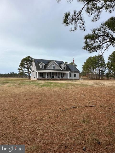 a view of house with ocean view