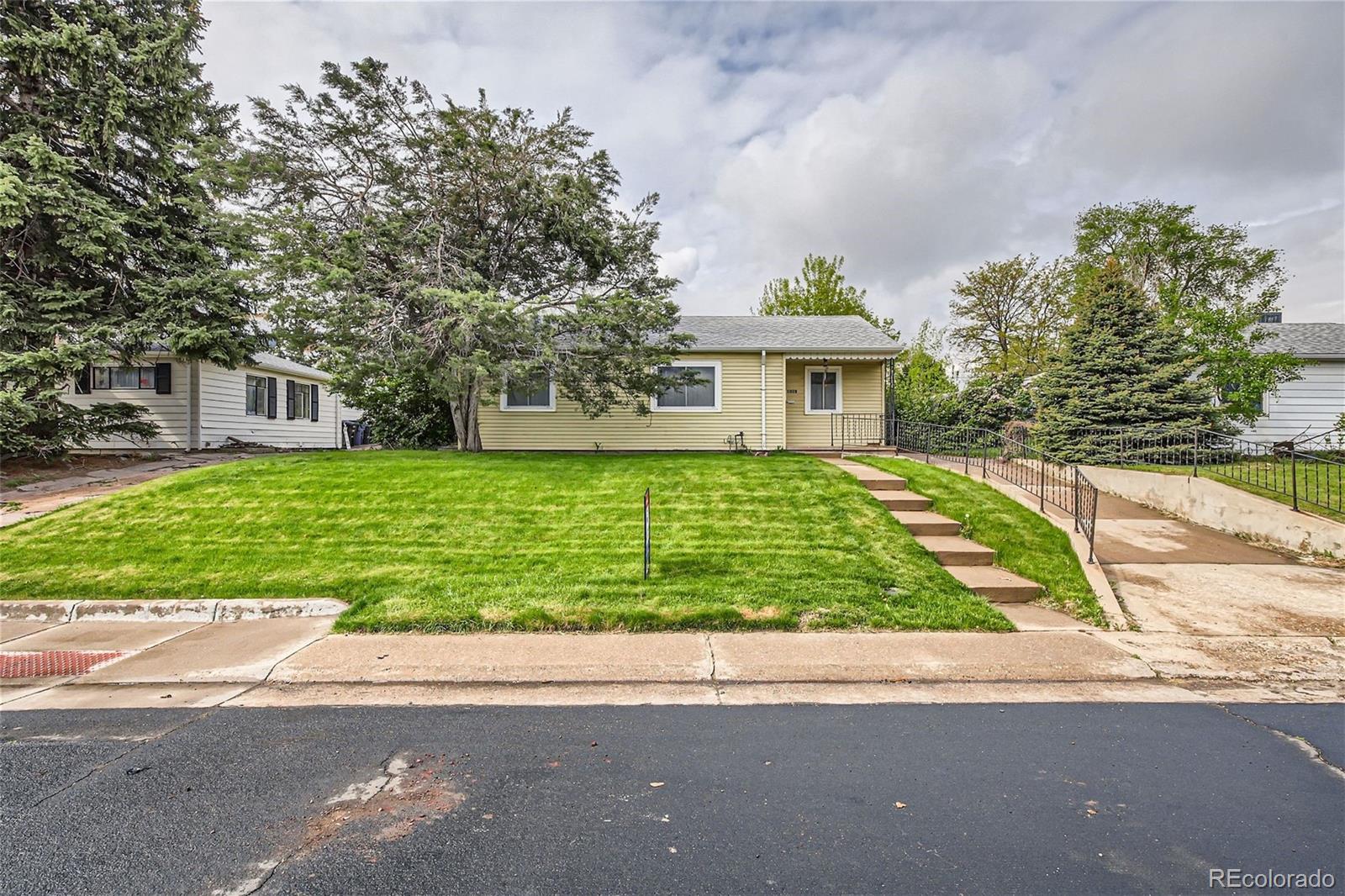 front view of house with a yard