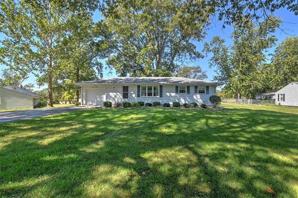 a view of a house with a big yard