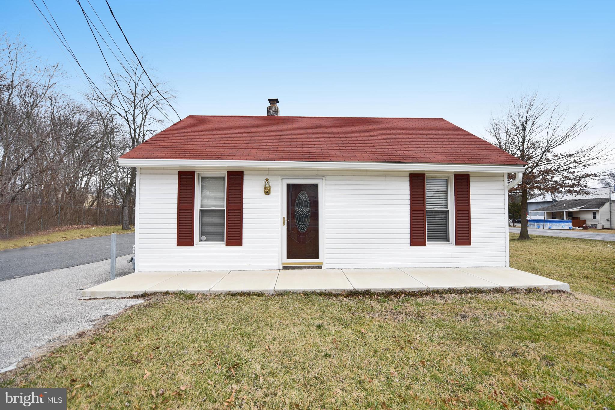 a house with yard in front of it